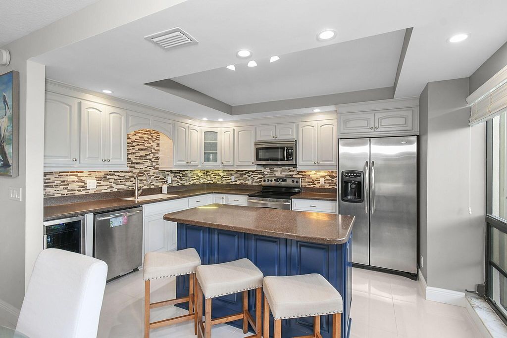 Photo of 460 Brackenwood Lane S, Palm Beach Gardens, FL 33418 (MLS # R11033092)