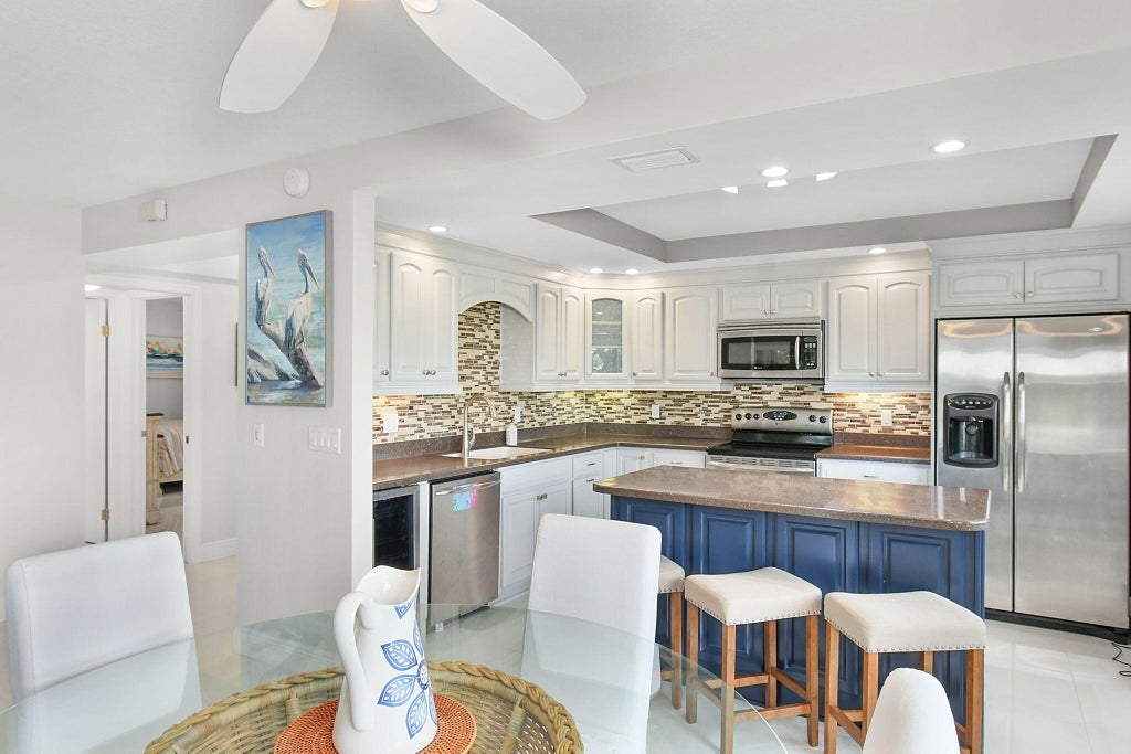 Photo of 460 Brackenwood Lane S, Palm Beach Gardens, FL 33418 (MLS # R11033092)