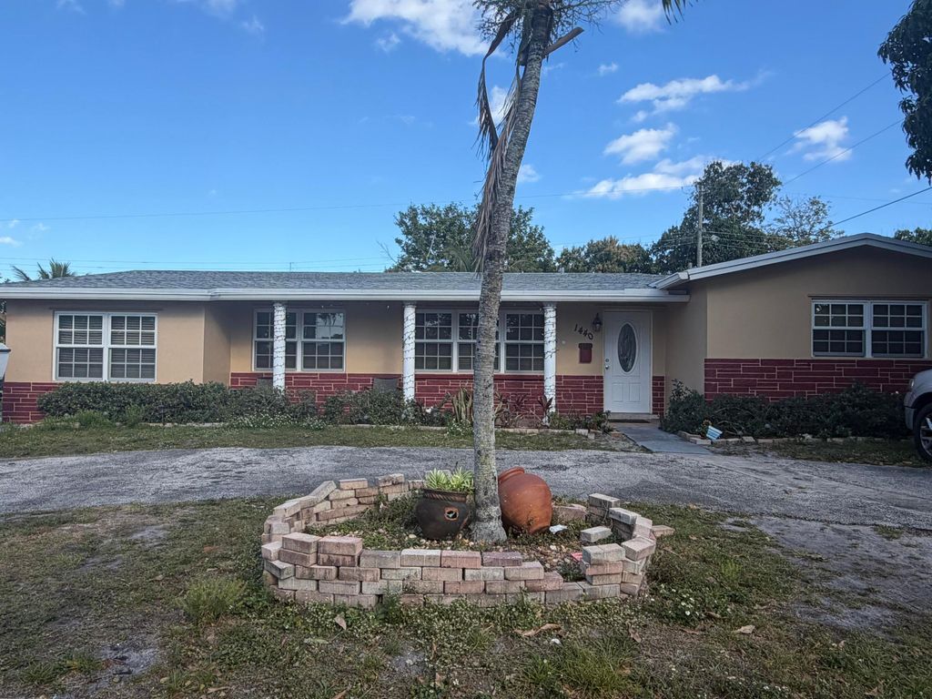 Photo of 1440 NW 58th Terrace, Sunrise, FL 33313 (MLS # R11168324)