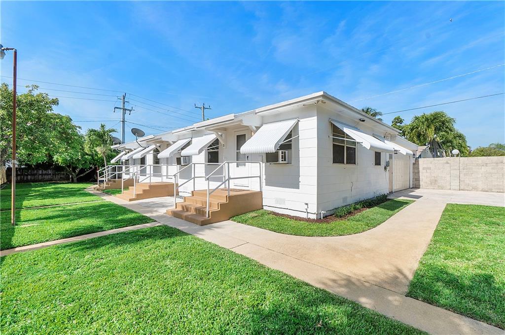 Rare opportunity to purchase this well-manicured, corner triplex East of Federal Highway. Charming front porches adorn each unit. Mature fruit trees and an abundance of green space provide a welcoming addition to outdoor living. Six dedicated parking spaces provide ample
room for owners and guests. An attached approximately 1500 square foot garage has
endless possibilities, including separate rental income. Steps from Publix, and walking
distance to the beach, this property won't last.