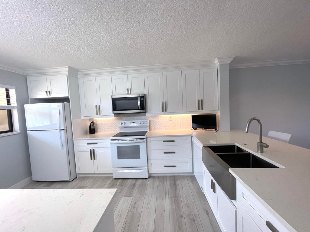 Photo of 13403 Touchstone Place #A-102, West Palm Beach, FL 33418 (MLS # R10957674)