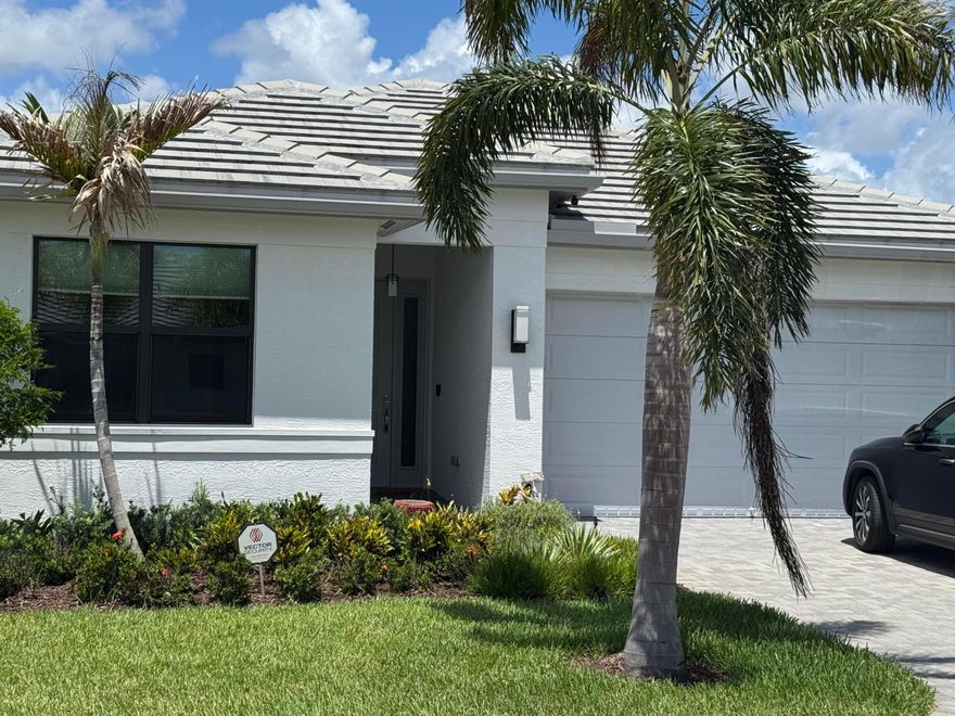 WATERFRONT 2024 home in Valencia Walk at Riverland.  Luxury living in the most popular 55 plus community in southeast Florida for active adults. Nearly new 2024 Sandpiper model in GL homes Valencia Walk development at Riverland in Port Saint Lucie Florida.  Stunning home with open concept floorplan with 1752 sq ft under air. Featuring 2 bedrooms, den/ 3rd bedroom, 2 baths, 2 car garage. Lots of upgrades including high gloss 2 x 2 porcelain tiles throughout the entire house, upgraded kitchen, lighting and fans, and polyaspartic garage floor coating. Custom paint throughout with no pictures ever hung on the walls! Direct waterfront lot with one of the best views and most private settings in the development. Furniture available. Evolution golf cart available. Riverland offers amenities second to none. Resort lifestyle with spectacular clubhouse, grand social hall, restaurant, card rooms, billiards room, pool, hot tub, and more all just within Valencia Walk. The adjacent Riverland common facilities a couple minutes away on a scenic golf cart ride down the interconnecting paseo include 24 acre state-of-the-art sportsplex and fitness center with 15 tennis courts, 53 pickleball courts, bocci, Olympic swimming pools, gym, and more.  Furniture available. 2024 Evolution golf cart available.