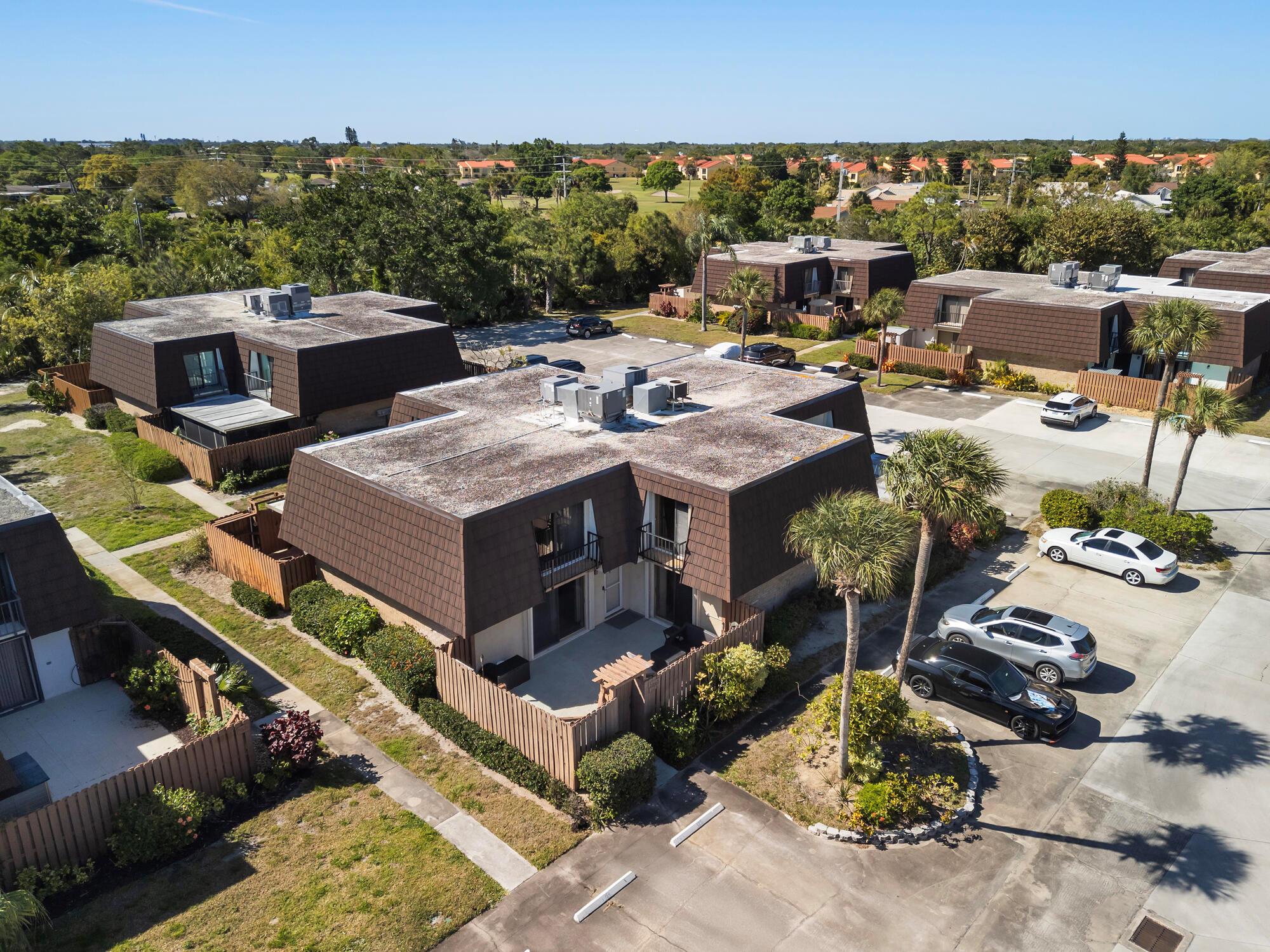 You'll love this charming and well-maintained townhome in the desirable River Pines community with water access! This spacious unit features a private courtyard, a beautifully redesigned kitchen, updated flooring throughout, and no carpet. The roof was replaced in 2023, and the seller has paid the assessment in full, offering added peace of mind. Resort-style amenities include two pools, tennis & pickleball courts, racquetball, and scenic walking trails. The community also offers water access with a boardwalk along the Intracoastal, plus a launch pad for kayaks, paddleboards, and more. Ideally located just minutes from shopping, dining, and downtown Stuart, this move-in-ready home is the perfect blend of comfort and coastal living. Don't miss out!