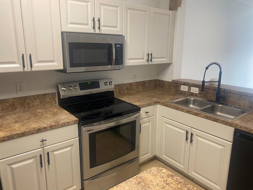 Photo of 3625 Sonoma Drive, Riviera Beach, FL 33404 (MLS # R11070774)