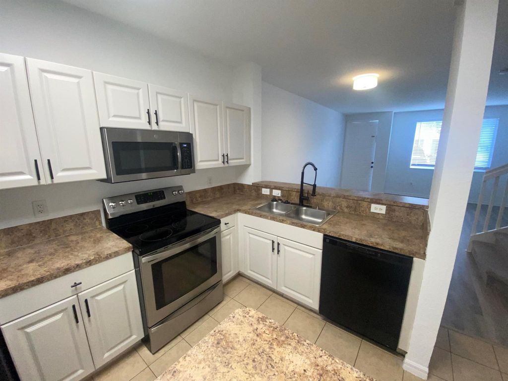 Photo of 3625 Sonoma Drive, Riviera Beach, FL 33404 (MLS # R11070774)
