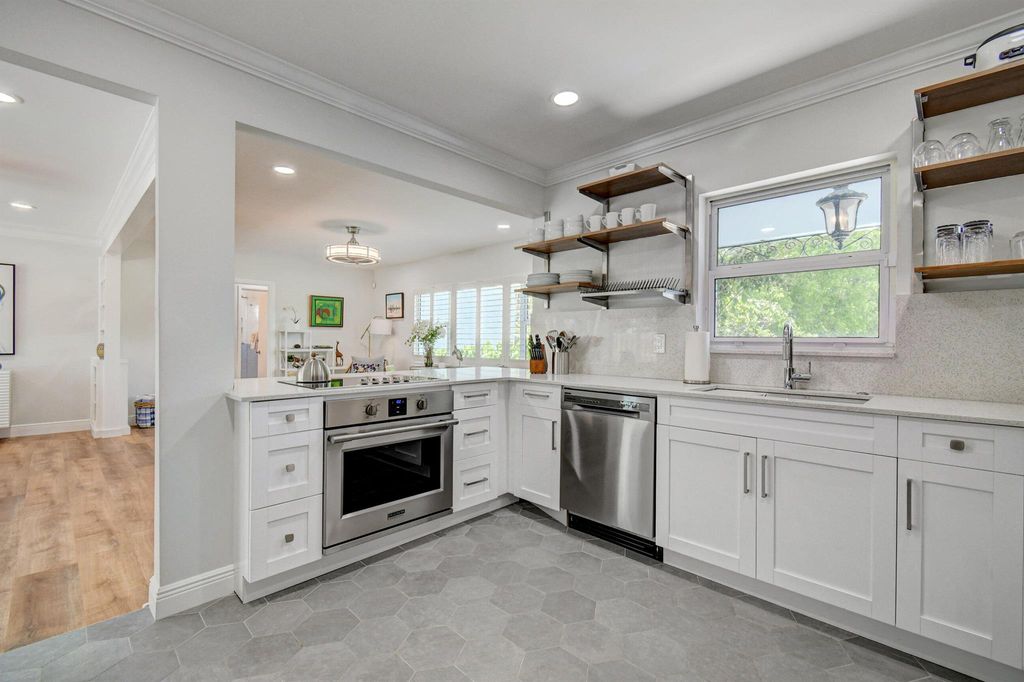 Photo of 309 Rilyn Drive, West Palm Beach, FL 33405 (MLS # R11147909)