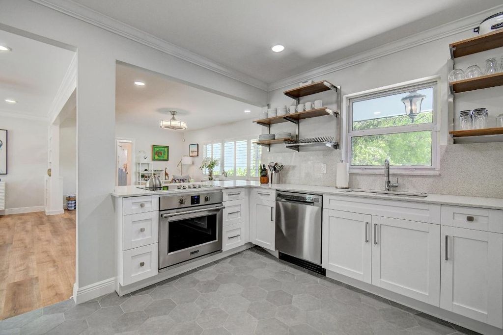 Photo of 309 Rilyn Drive, West Palm Beach, FL 33405 (MLS # R11147909)