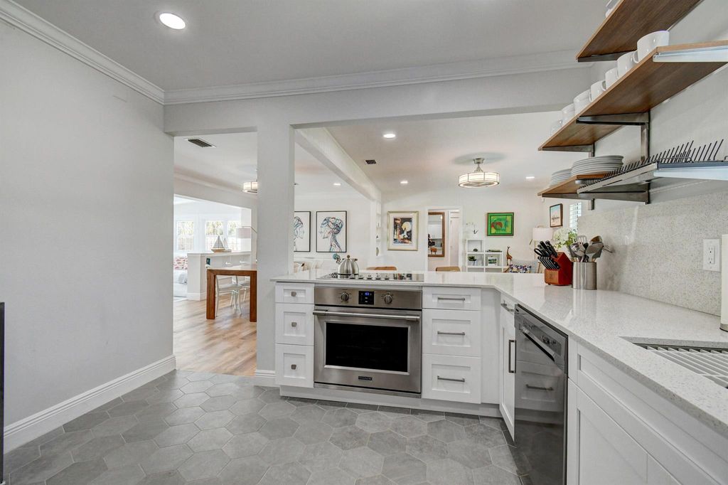 Photo of 309 Rilyn Drive, West Palm Beach, FL 33405 (MLS # R11147909)