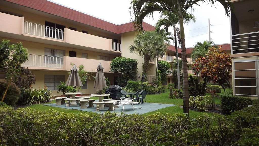 Photo of 3071 NW 47th Terrace #129, Lauderdale Lakes, FL 33313 (MLS # F10514958)