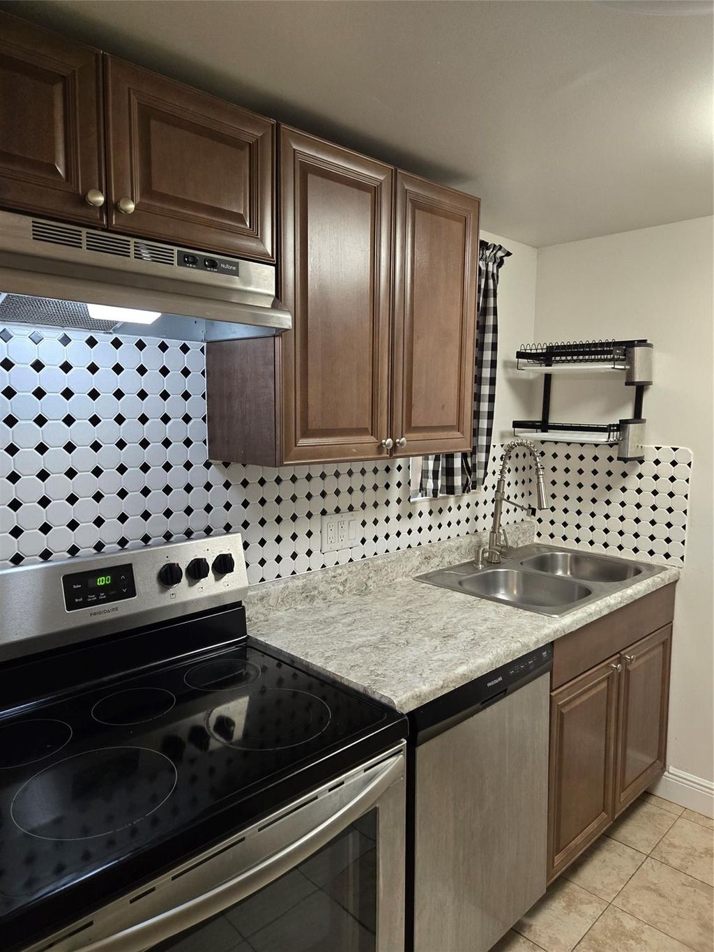 Photo of 3071 NW 47th Terrace #129, Lauderdale Lakes, FL 33313 (MLS # F10514958)