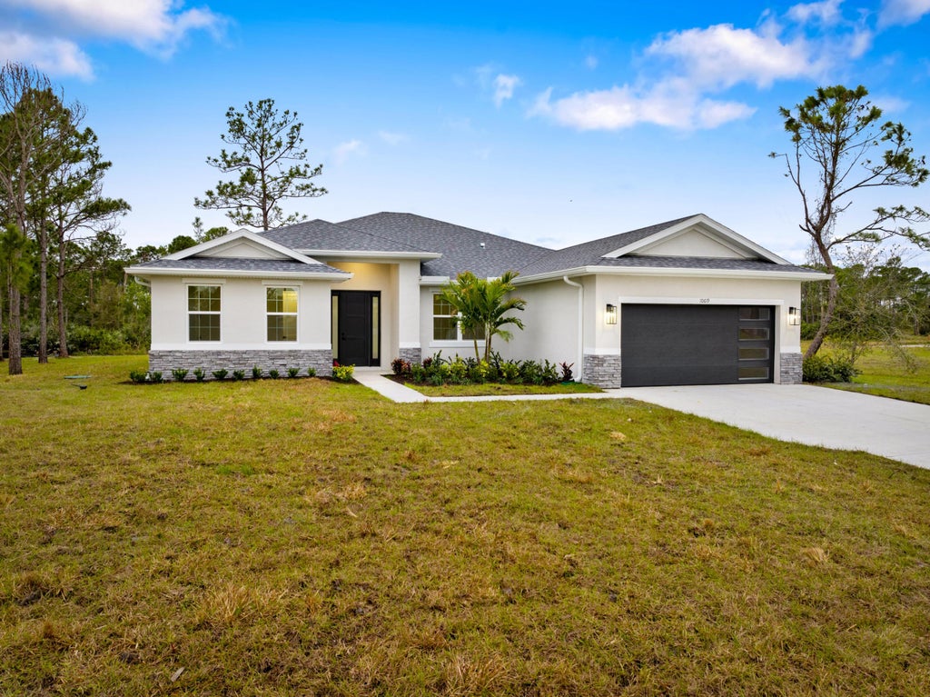 Photo of 10619 Sugar Pine Drive, Fort Pierce, FL 34945 (MLS # R11054648)