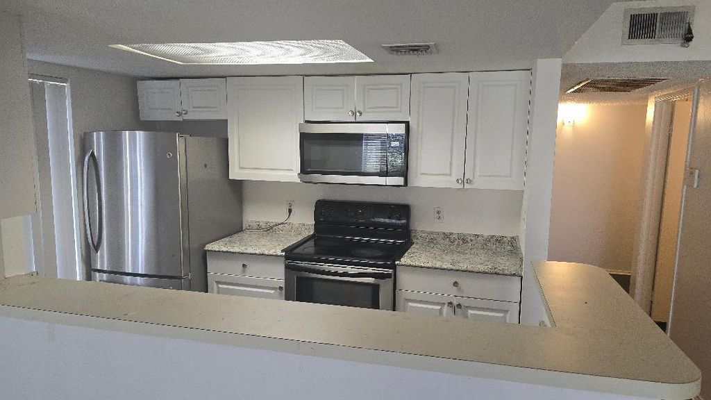 Photo of 3194 Coral Lake Lane #3194, Coral Springs, FL 33065 (MLS # B26012929)