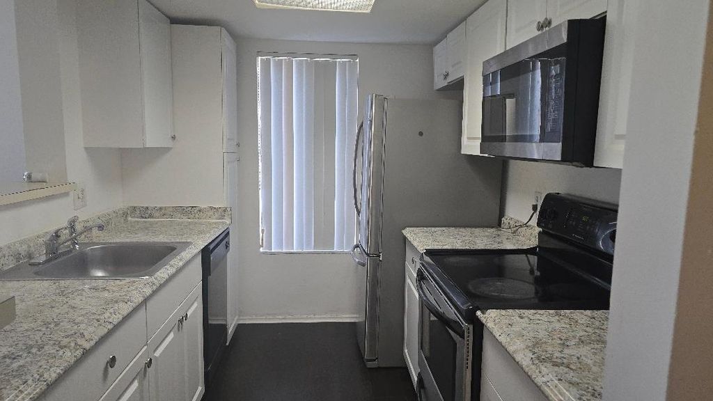 Photo of 3194 Coral Lake Lane #3194, Coral Springs, FL 33065 (MLS # B26012929)