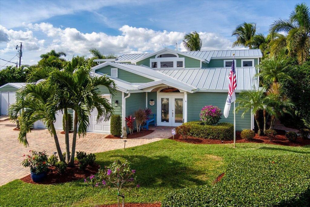 Photo of 340 SW Beachway Avenue, Palm City, FL 34990 (MLS # R10956036)