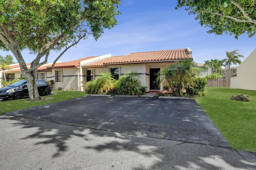 Photo of 11218 SW 58th Circle, Cooper City, FL 33330 (MLS # B26052847)