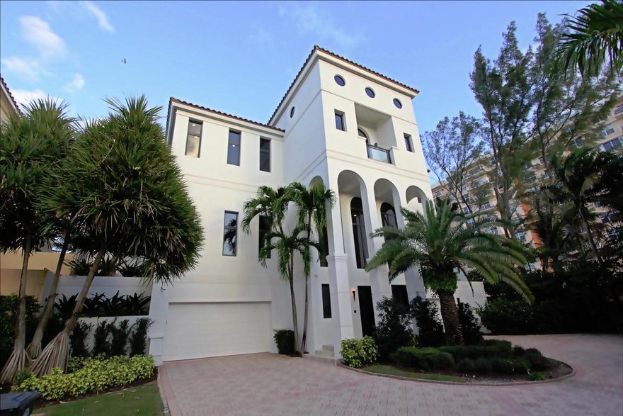 ** SELLER FINANCING AVAILABLE ** Interior and Exterior Completely Renovated and Remodeled in 2014. This Magnificent Bright, Airy Three Story Modern Oceanfront Beachside Getaway Boasts More Than 9,000 Square Feet Of Sleek Understated Elegance, Charm and Sophistication. Majestically Perched Atop the Powdery Sands of Ultra-Exclusive Highland Beach, Ocean Place Estates is Southern Palm Beach County's Only Guard-Gated Oceanfront Estate Enclave. Craftsman Quality Design Elements Coupled with Cutting Edge Technology Make This Glamorous Entertainers' Paradise a Sensory Delight to Behold. A Rare Jewel Conveniently Located Nearby the First Class Shopping / Dining of Mizner Park and Downtown Atlantic Avenue in Delray Beach. Short Distance to Boca Raton Executive Airport.