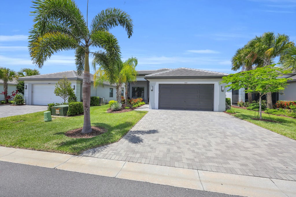 Photo of 11601 SW Marine Way, Port Saint Lucie, FL 34987 (MLS # B26031298)