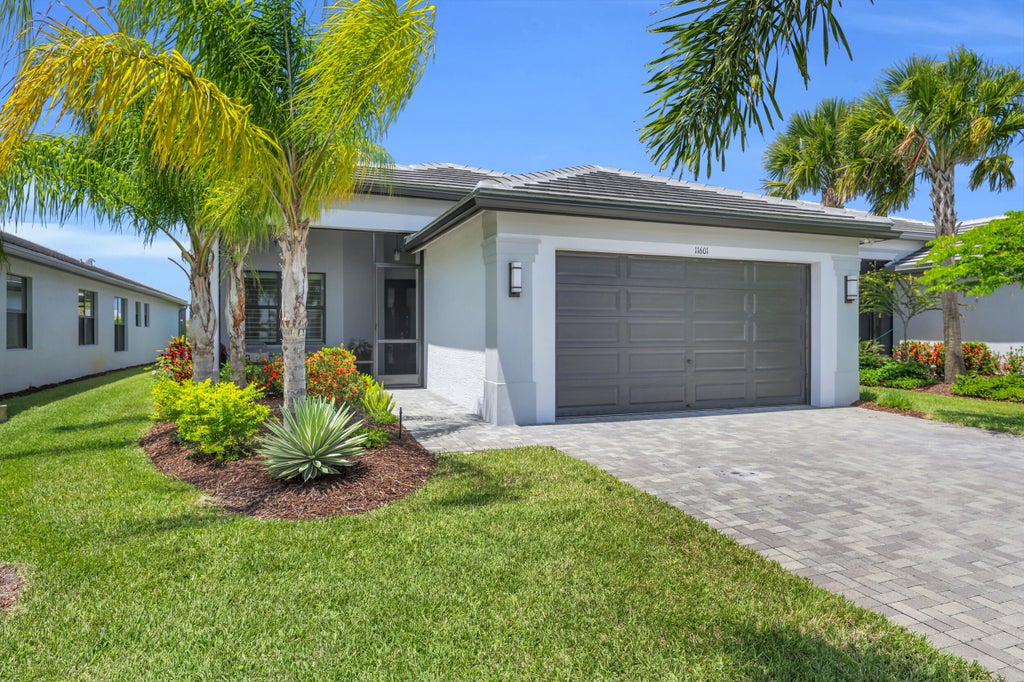 Photo of 11601 SW Marine Way, Port Saint Lucie, FL 34987 (MLS # B26031298)