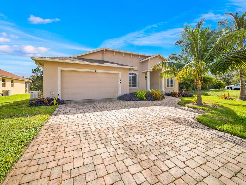 Photo of 168 SW Oakridge Drive, Port Saint Lucie, FL 34984 (MLS # R11033451)