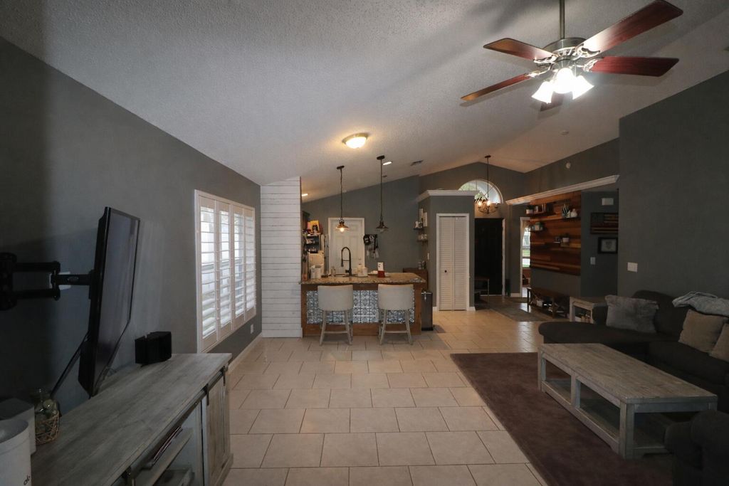 Photo of 6418 Pompano Street, Jupiter, FL 33458 (MLS # B26002163)