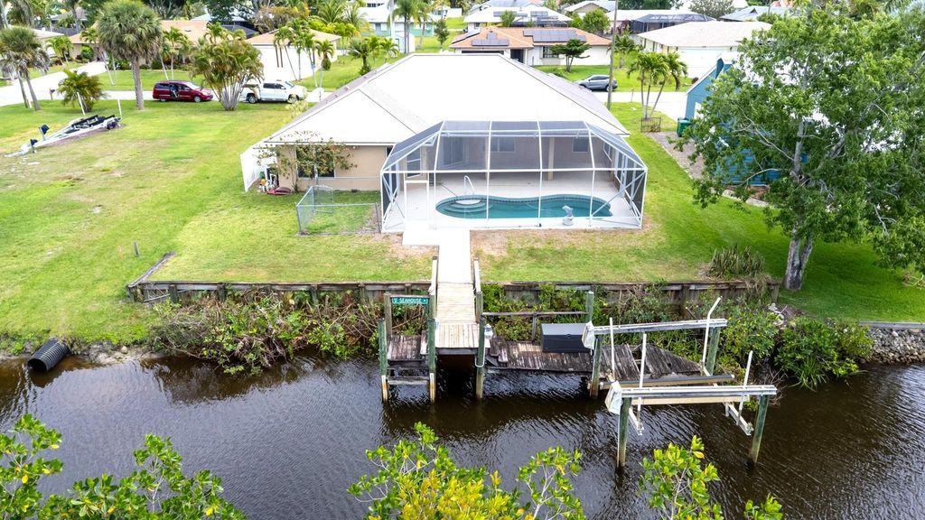 Photo of 852 SE Seahouse Drive, Port Saint Lucie, FL 34983 (MLS # R11079008)