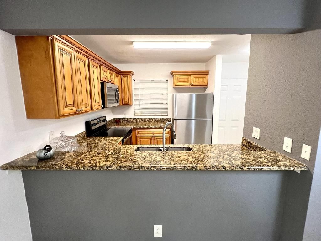 Photo of 1581 Balfour Point Drive #E, West Palm Beach, FL 33411 (MLS # R11139049)