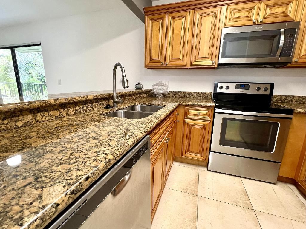 Photo of 1581 Balfour Point Drive #E, West Palm Beach, FL 33411 (MLS # R11139049)