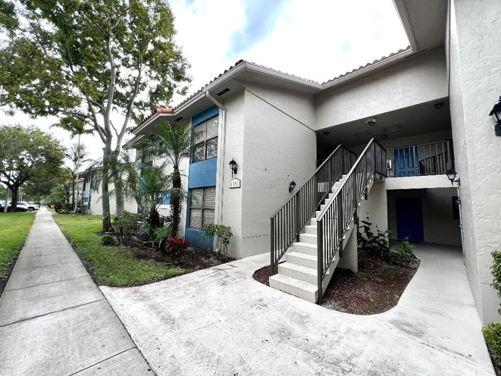 Photo of 1581 Balfour Point Drive #E, West Palm Beach, FL 33411 (MLS # R11139049)
