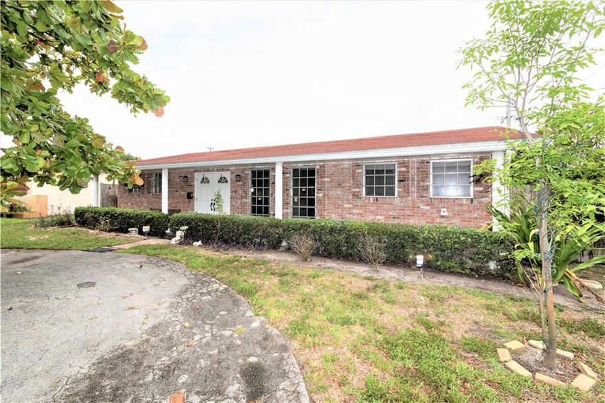 Located in Hollywood Hills, this wonderful 3 Bed 2 Bath home is ready for your personal touches!  A large square foot living area (1800) for the area and price, this home boasts an open layout to give the new buyer multiple  options.  The split floor plan has a separate master suite with a walk-in closet, as well as a master bathroom. There is a separate gated access to the over sized one car garage, and a fenced in back yard with large producing mange and avocado trees.  Centrally located between Hollywood, Fort Lauderdale, FLL, Hard Rock Casino and Hotels, this home offers easy access to all of South Florida’s amenities.