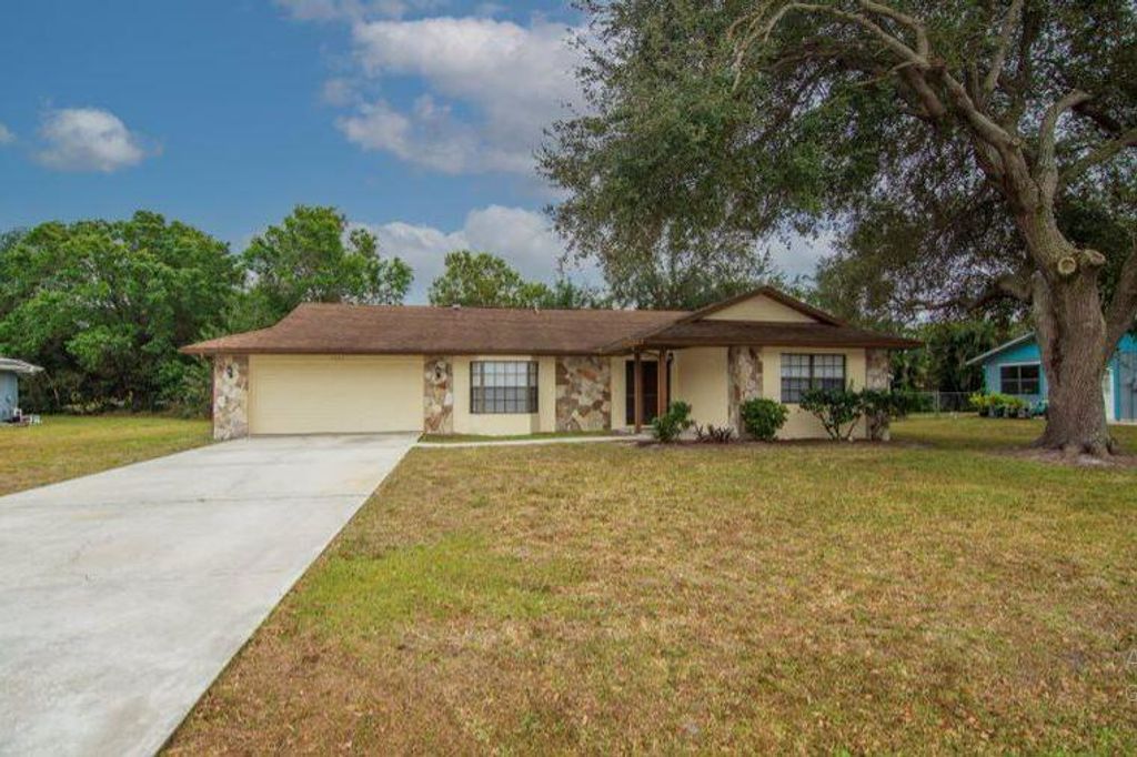 Photo of 5404 Paleo Pines Circle, Fort Pierce, FL 34951 (MLS # R10775812)