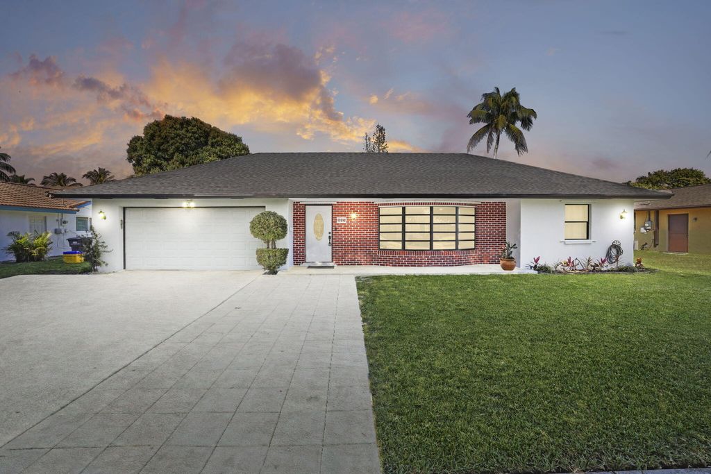 Photo of 1667 39th St, West Palm Beach, FL 33407 (MLS # B26000682)