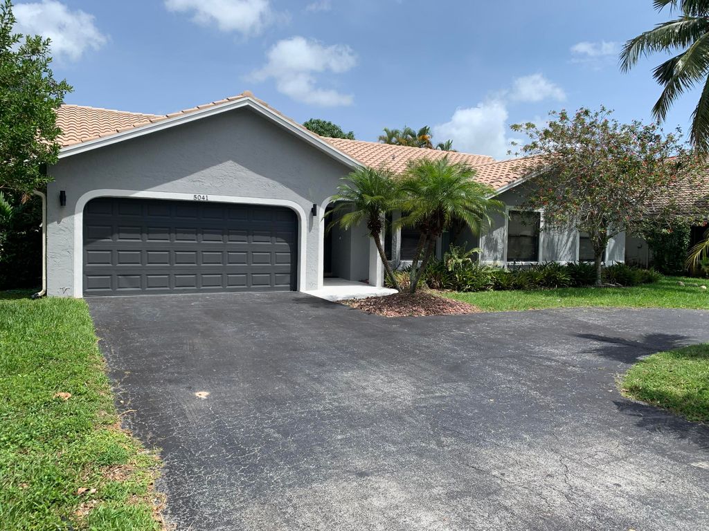 Photo of 5041 NW 64th Drive Dr, Coral Springs, FL 33067 (MLS # R10815876)