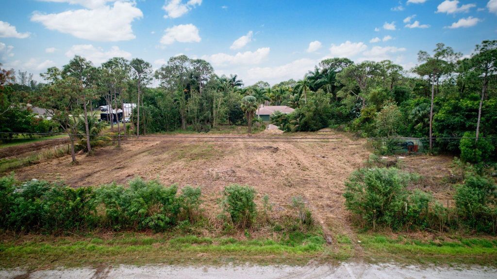 Photo of Xxxxx 31st Rd N, The Acreage, FL 33470 (MLS # R11080108)
