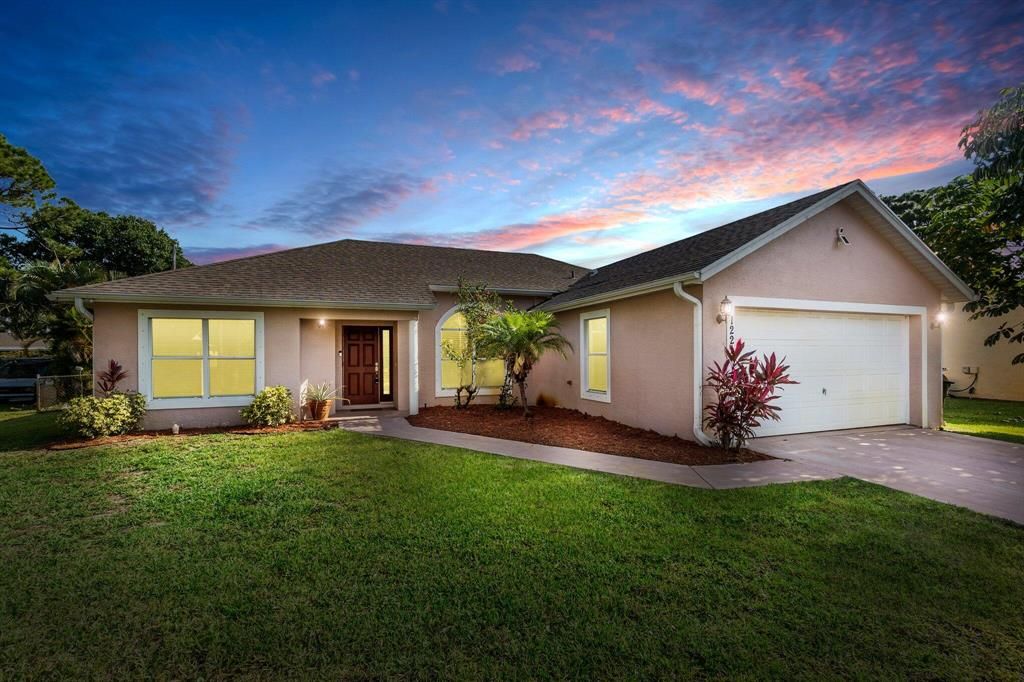 Photo of 1221 SW Sudder Avenue, Port St Lucie, FL 34953 (MLS # R10888191)