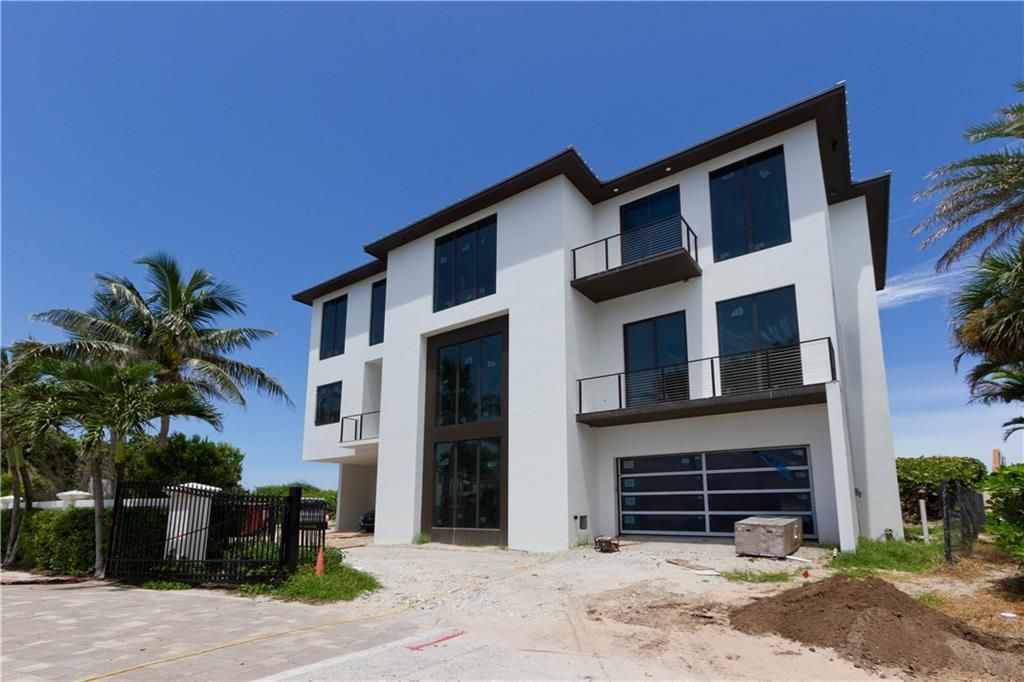 Photo of 8120 S Ocean Drive, Jensen Beach, FL 34957 (MLS # R10960439)