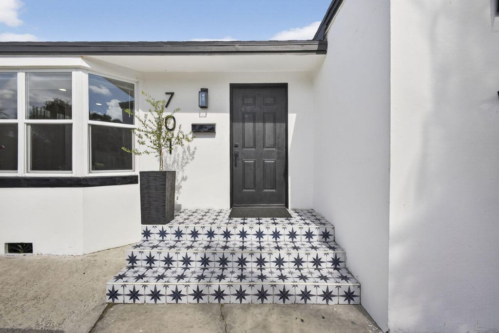 Photo of 701 37th Street, West Palm Beach, FL 33407 (MLS # B26012138)