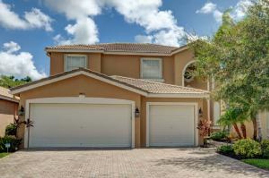 Fantastic 5 bedroom, 4 1/2 bath, 3 car garage home in Isola Bella. Freshly painted throughout. Kitchen features wood cabinets, granite counters, breakfast bar & nook, new stainless energy efficient appliances & LED lighting. Bedroom 5/office & full bath are on the first floor. Master bedroom on the 2nd floor has two large walk-in closets, tray ceiling, plus a ''his & her'' full bath and unique half bath. Three more bedrooms, 2 full baths,  laundry room, & roomy loft are also on the second floor. This home has a large screened patio and private back yard. Yard has electric dog fence. Isola Bella is an upscale gated community with clubhouse, pool and gym, and tennis courts. And, great schools, too - Manatee Elementary, Christa McAuliffe Middle, Park Vista High. You don't want to miss this!