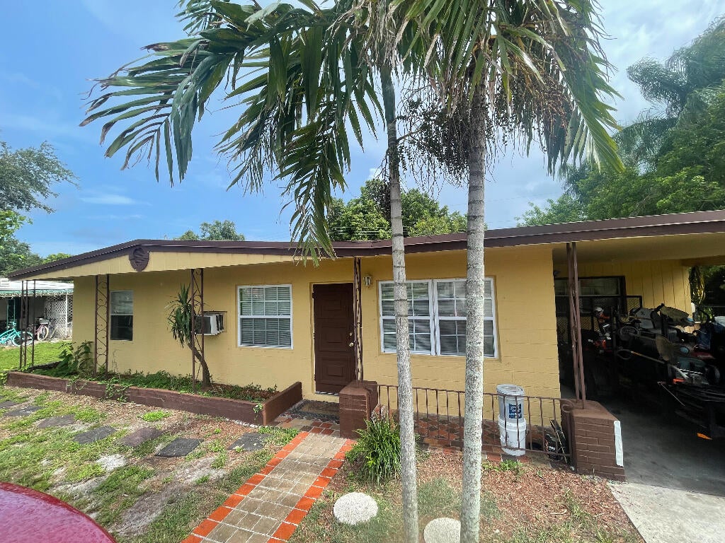 Photo of 353 E Midway Road, Fort Pierce, FL 34982 (MLS # R10811496)