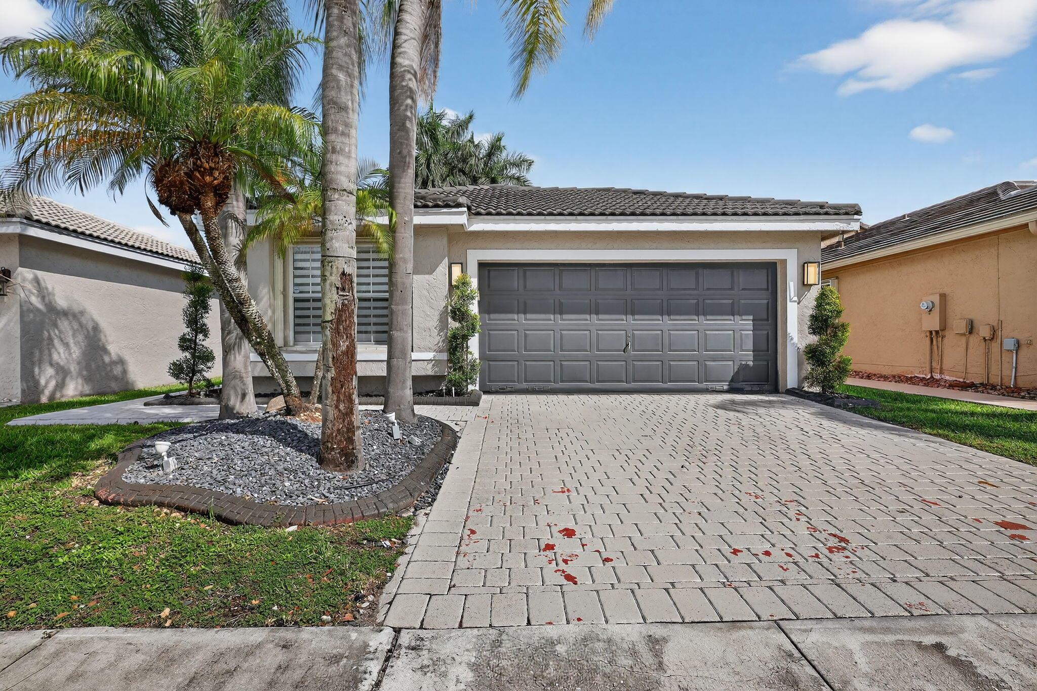 Welcome to Silver Lakes' Sapphire Shores! This 3-bed, 2-bath home includes a large versatile den that can serve as a 4th bedroom or office. Enjoy updated tile and laminate floors, a bright living room, and a spacious master suite with large walk-in closet. Relax in your backyard with lake views, perfect for barbecues or adding a pool - Make this your home and take the change to entertain friends and family! Home also has a 2-car garage plus extended driveway offers extra parking. Nestled in a tree-lined, serene neighborhood with A-rated schools, residents also enjoy a clubhouse, two pools, and a playground.
