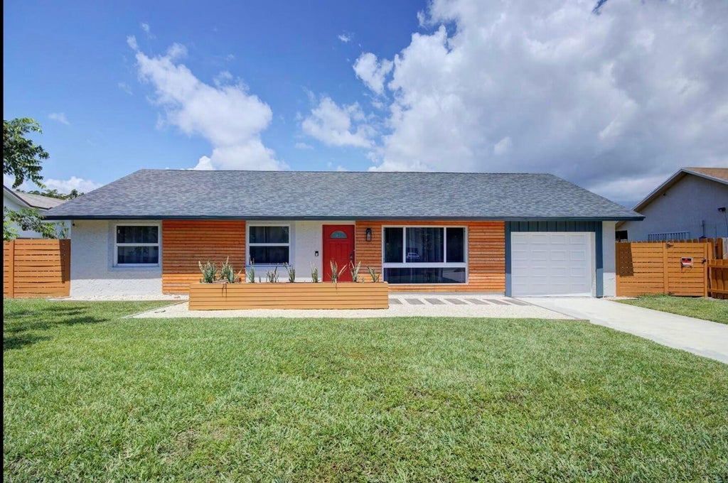 Photo of 3026 Dunlin Road, Delray Beach, FL 33444 (MLS # B26047809)