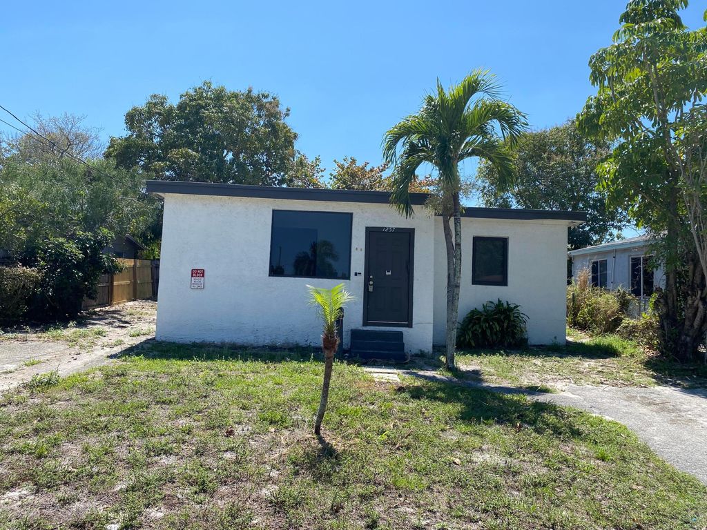 Photo of 1257 W 35th Street, Riviera Beach, FL 33404 (MLS # B26006298)