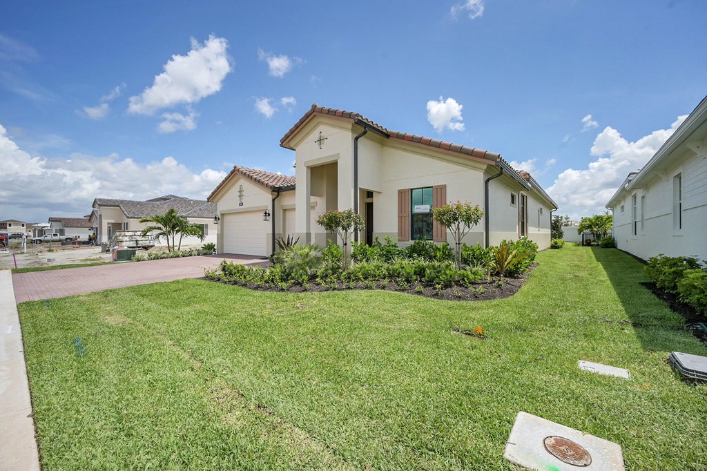 Photo of 9528 St. Germain Drive, Palm Beach Gardens, FL 33412 (MLS # B26075952)
