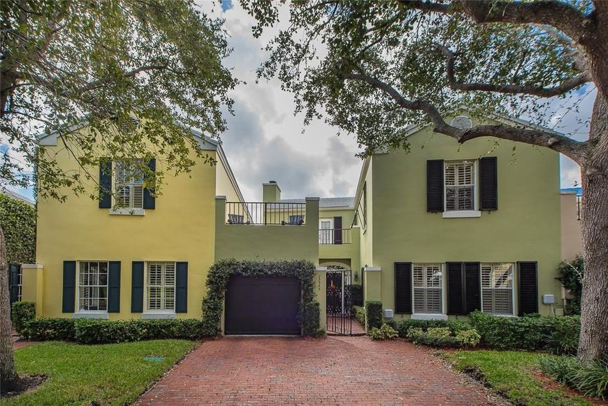 Welcome to the warmth and beauty of Charleston Place. This large townhome offers a beautiful, updated kitchen, new bathrooms, hardwood floors, crown molding, wood-burning fireplace with mantle, French doors, and plantation  shutters.  Enjoy the stunning view of the serene park from the new sundeck or the lake behind the charming patio.  Amenities incl 4 pools, landscaping & seasonal parties at the gazebo. Graced with gorgeous oak trees & arches of bougainvillea, this exquisite neighborhood speaks of home.