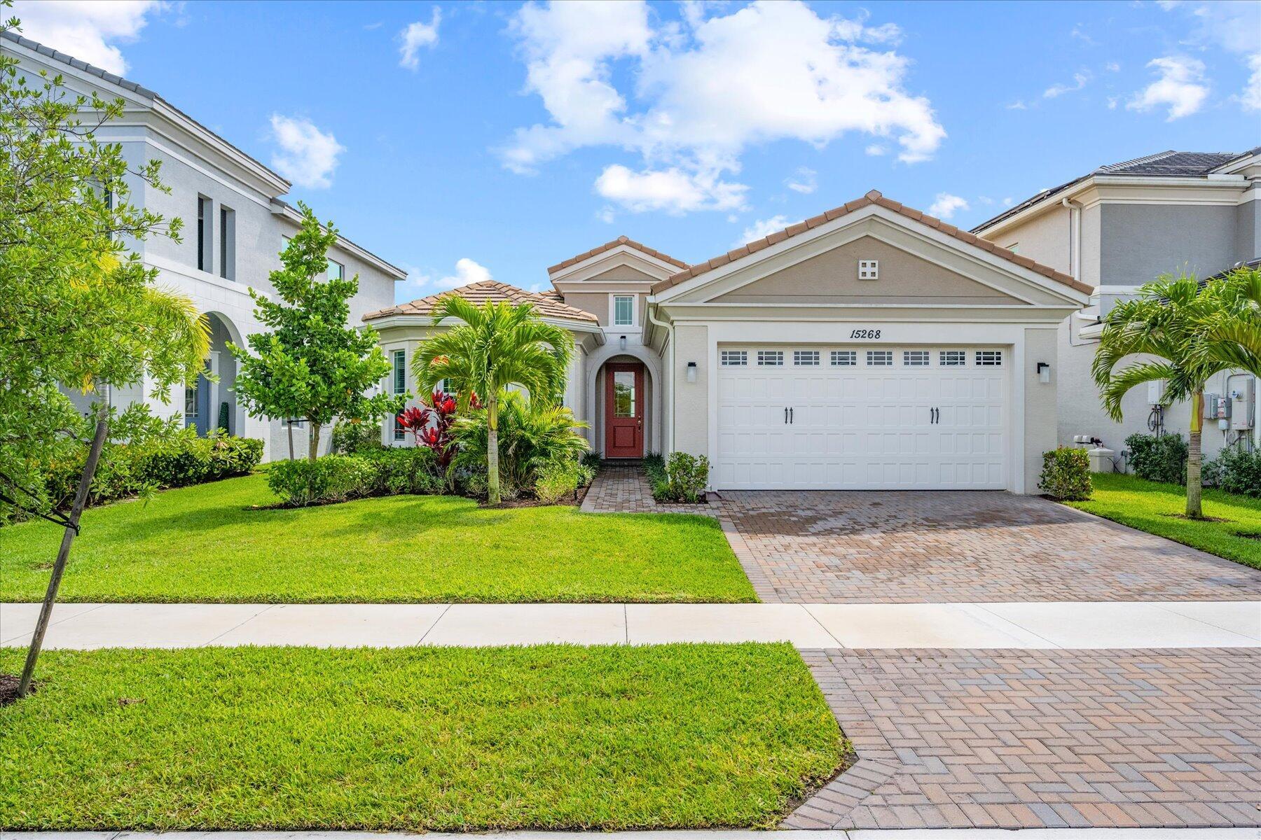 Stunning Marlberry model home with 3 bedrooms and 2 bathrooms located in the Meadows of Westlake. This home features a spacious eat-in kitchen with an island and ample cabinet space, perfect for culinary enthusiasts. Enjoy the elegance of a formal dining room and generously sized bedrooms. Experience the luxury of tile flooring throughout the entire home, complemented by granite countertops and stainless steel appliances in the kitchen. Benefit from the added security and efficiency of impact windows. Relish in the serene lake views from your screened patio while witnessing Westlake's beautiful sunrise. Take advantage of the resort-style amenities, including a lagoon pool with a 3-story slide, splash pad, cabanas, lawn space for parties, Snack Shack, outdoor concert pavilion,