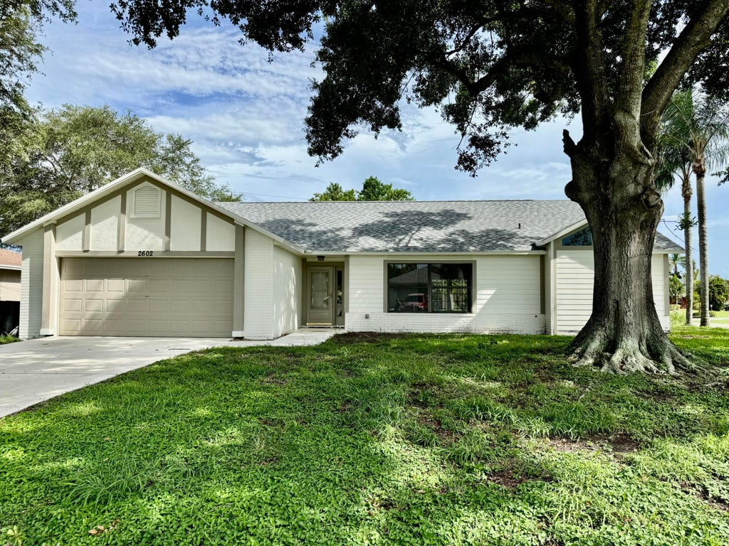 Photo of 2602 SW Union Terrace, Port Saint Lucie, FL 34953 (MLS # R11010460)