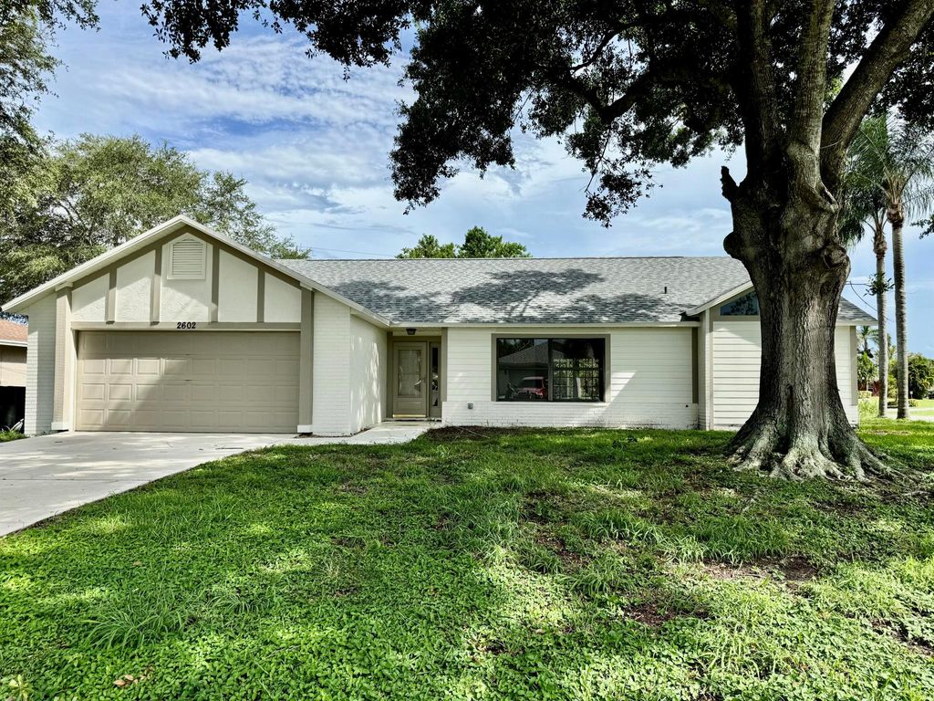 Photo of 2602 SW Union Terrace, Port Saint Lucie, FL 34953 (MLS # R11010460)