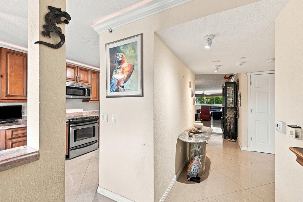Photo of 2541 N NOB HILL Road #308, Sunrise, FL 33322 (MLS # B26064477)
