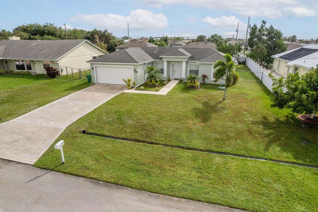 Photo of 958 SW Jaslo Avenue, Port Saint Lucie, FL 34953 (MLS # R10944087)