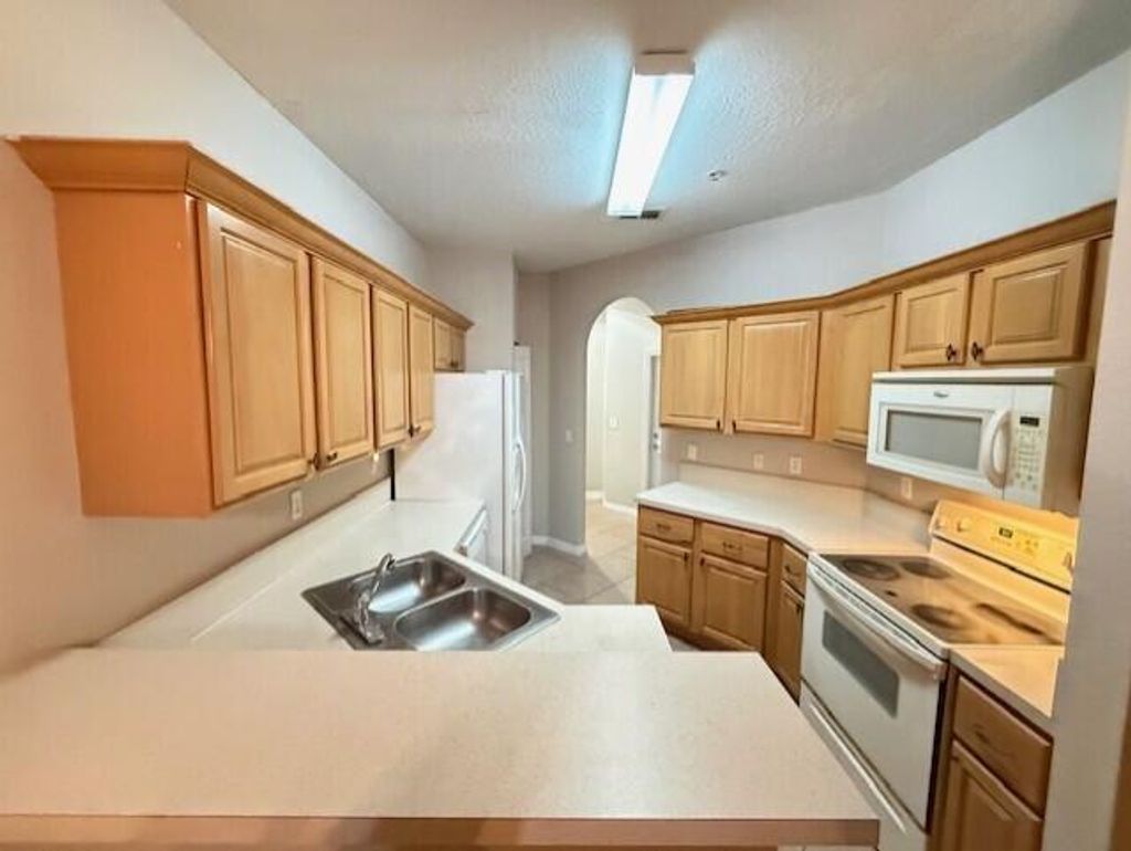 Photo of 821 Pipers Cay Drive, West Palm Beach, FL 33415 (MLS # R11164408)