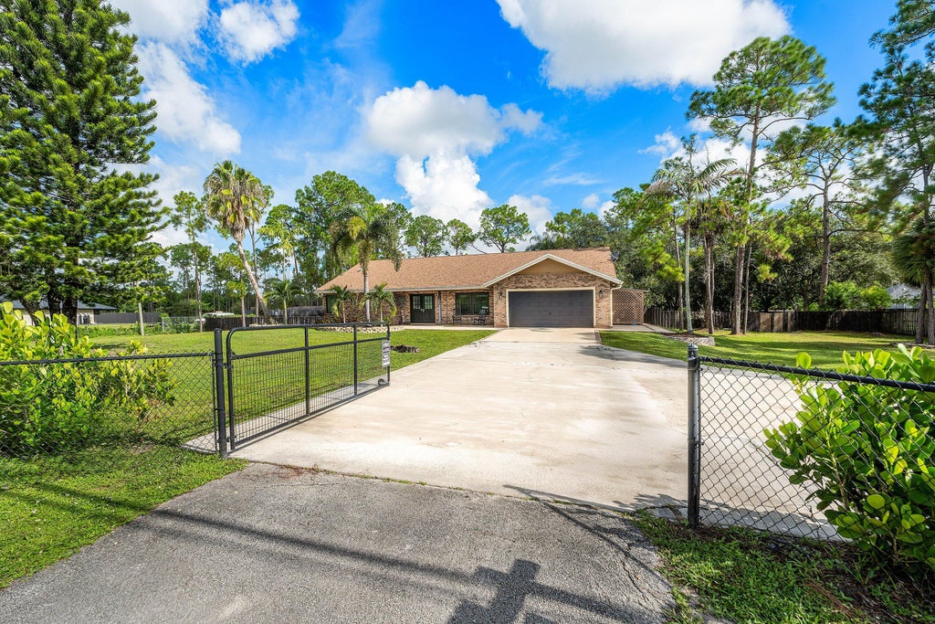 Photo of 18429 Sycamore Drive W, Loxahatchee, FL 33470 (MLS # B26070685)